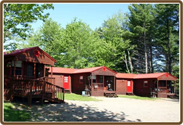 view of front of home with a deck