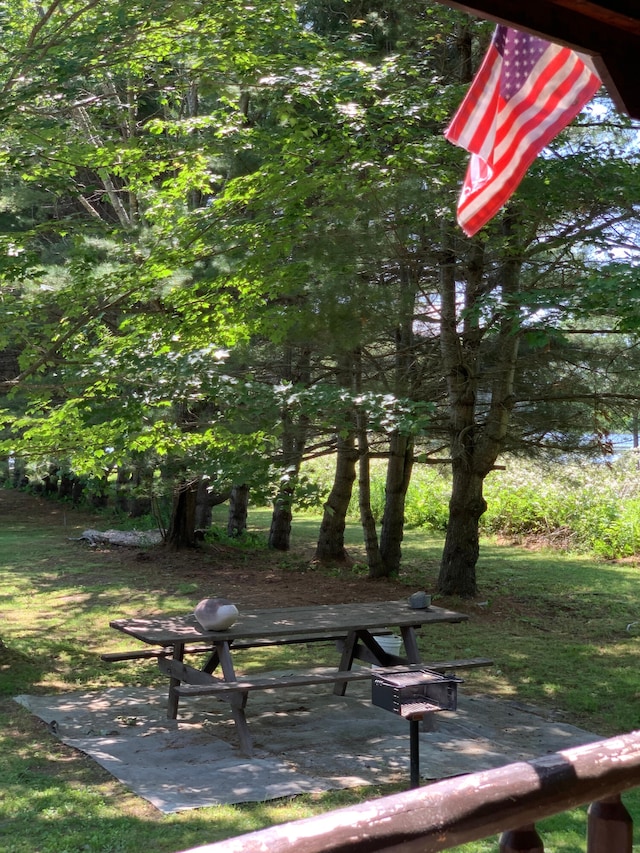 view of property's community featuring a patio area