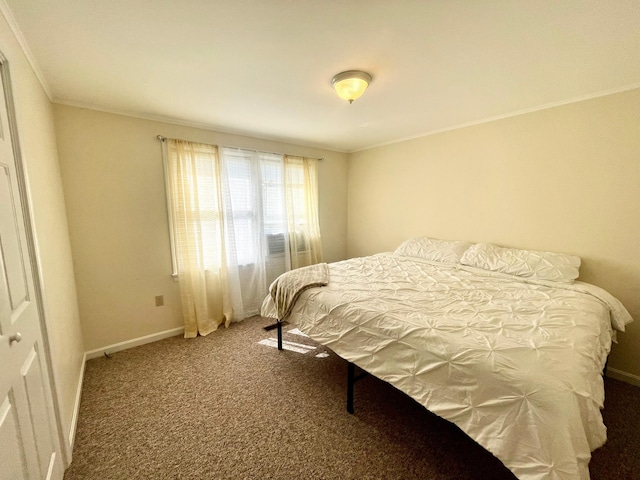 carpeted bedroom featuring a closet and ornamental molding