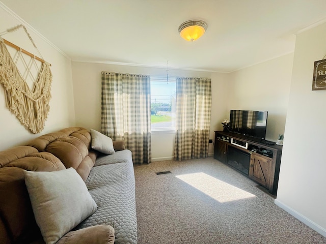 carpeted living room featuring crown molding