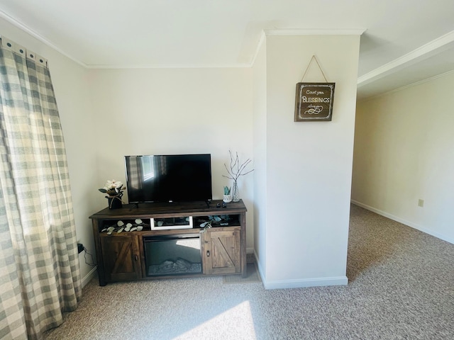 carpeted living room featuring ornamental molding