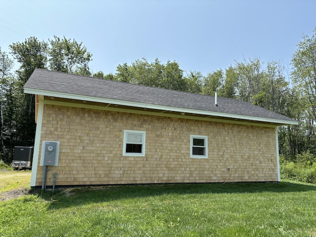 view of property exterior with a lawn