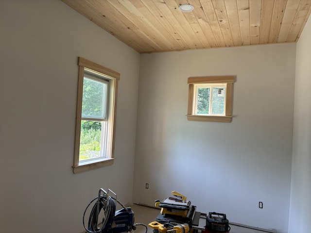 empty room with wooden ceiling