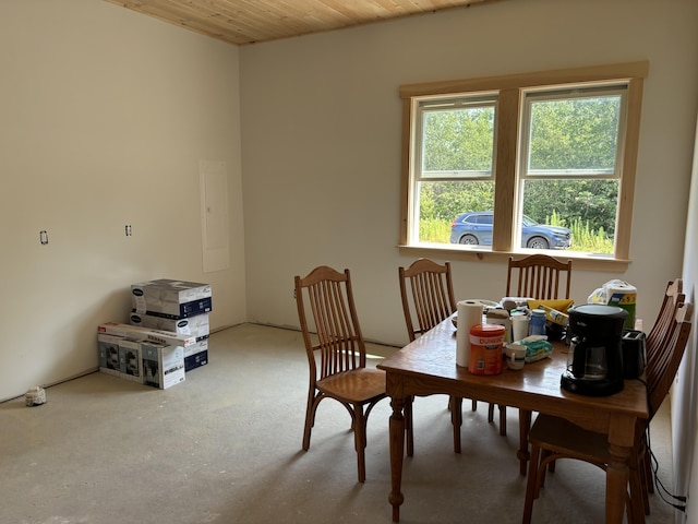 dining room with wooden ceiling