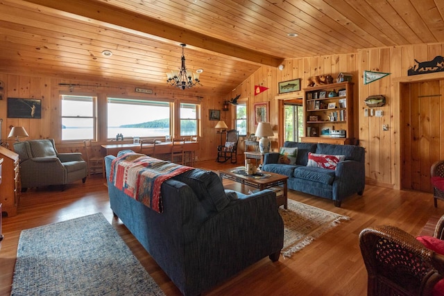 228 Starbird Ln, Rome, ME 04963 - living area featuring wood walls, a chandelier, wood finished floors, and wood ceiling