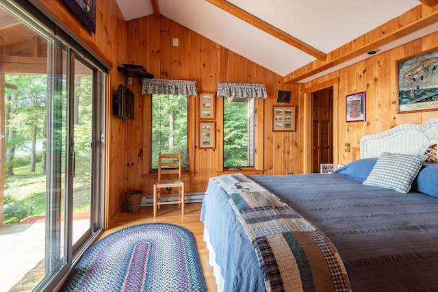228 Starbird Ln, Rome, ME 04963 - bedroom with wooden walls, access to exterior, and light wood-type flooring