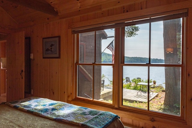 228 Starbird Ln, Rome, ME 04963 - bedroom with a water view and wood walls
