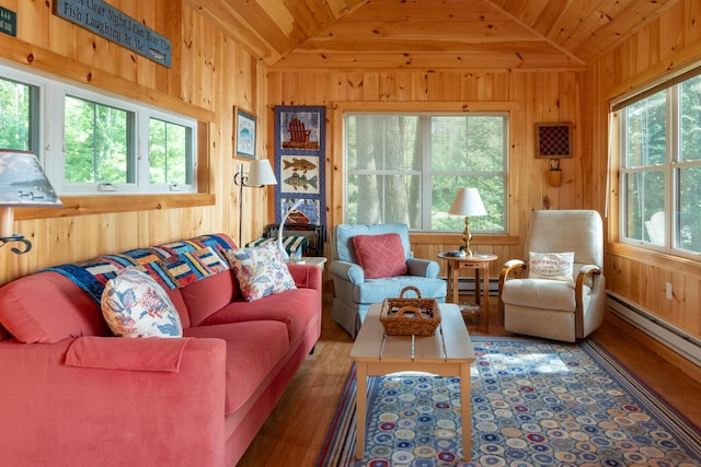 228 Starbird Ln, Rome, ME 04963 - living room with lofted ceiling, wooden walls, wooden ceiling, baseboard heating, and wood finished floors
