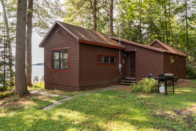 228 Starbird Ln, Rome, ME 04963 - back of property featuring a lawn