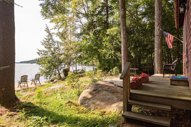 228 Starbird Ln, Rome, ME 04963 - view of yard featuring a deck with water view