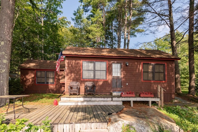 228 Starbird Ln, Rome, ME 04963 - back of property with a wooden deck
