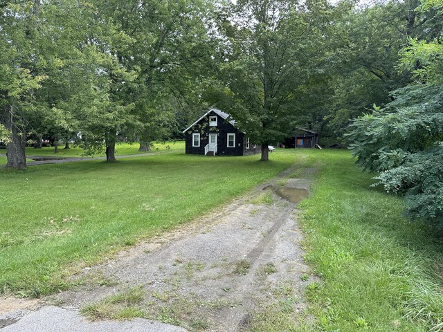 114 Skowhegan Rd, Fairfield, ME 04937 - view of green lawn with driveway