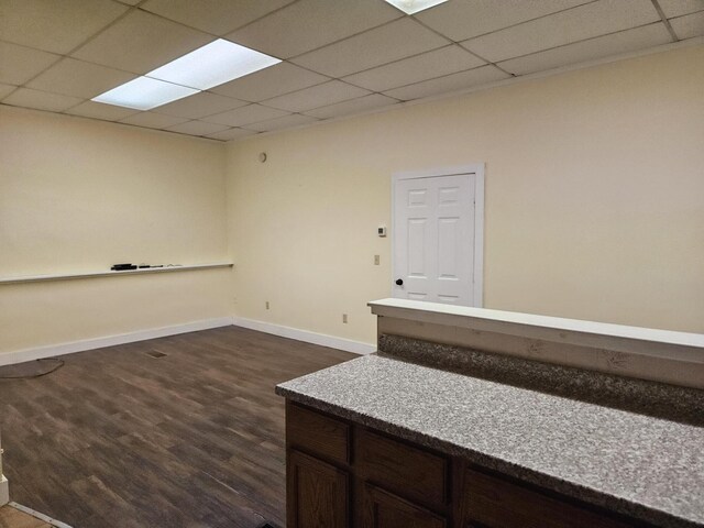 55 Cony St, Augusta, ME 04330 - spare room featuring a paneled ceiling, dark wood-style floors, and baseboards