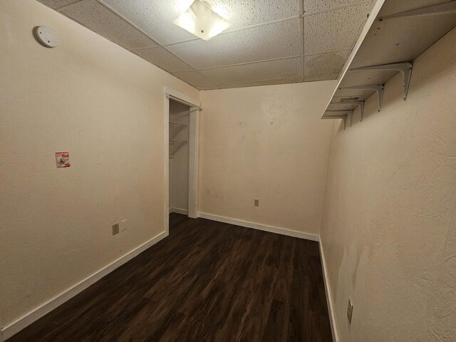 55 Cony St, Augusta, ME 04330 - unfurnished bedroom with a paneled ceiling, wood finished floors, baseboards, and a closet