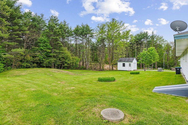 7 Alweber Rd, Windham, ME 04062 - view of green lawn with an outdoor structure