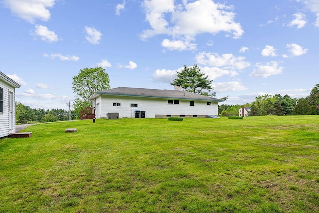 7 Alweber Rd, Windham, ME 04062 - back of house with a yard and central AC unit