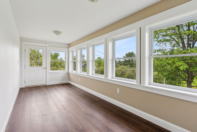 7 Alweber Rd, Windham, ME 04062 - unfurnished sunroom with baseboards and wood finished floors