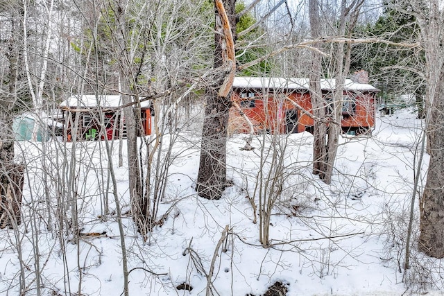 view of snow covered property