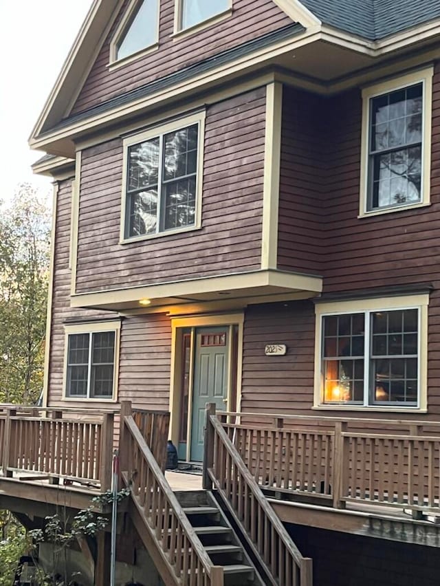 view of front of house with a wooden deck