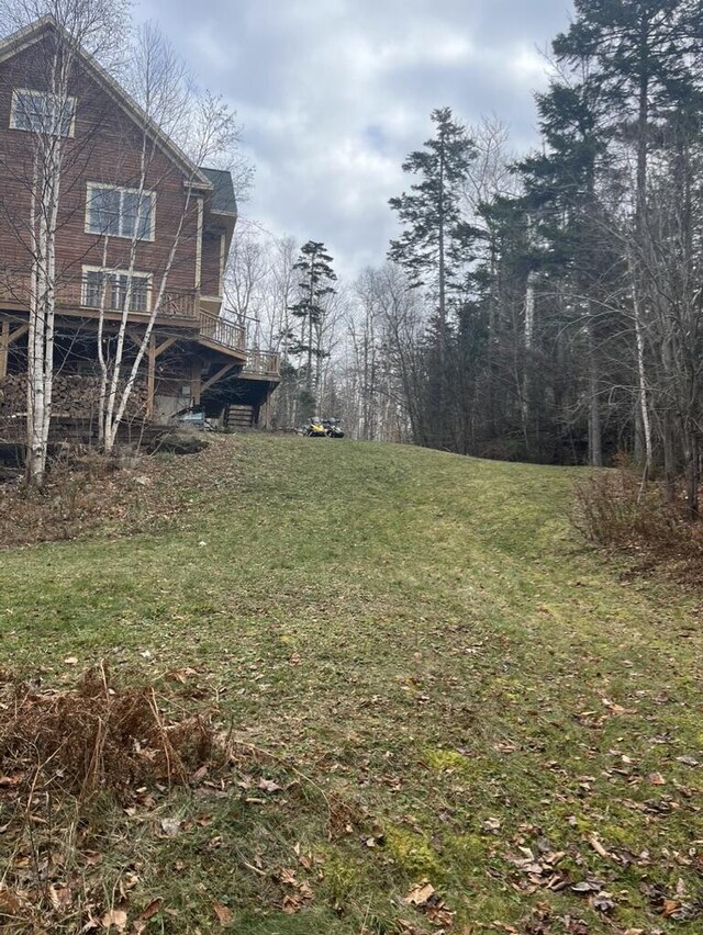 view of yard featuring a deck