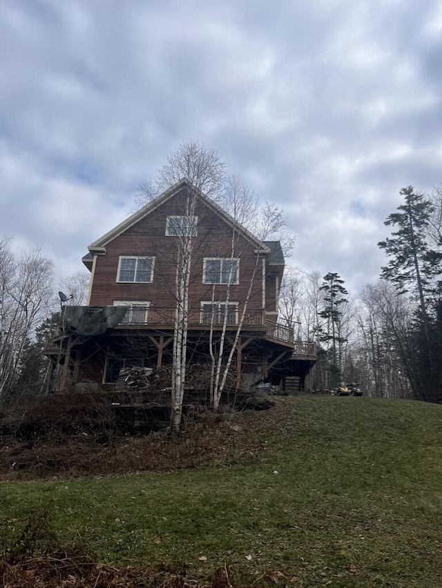 view of home's exterior with a yard