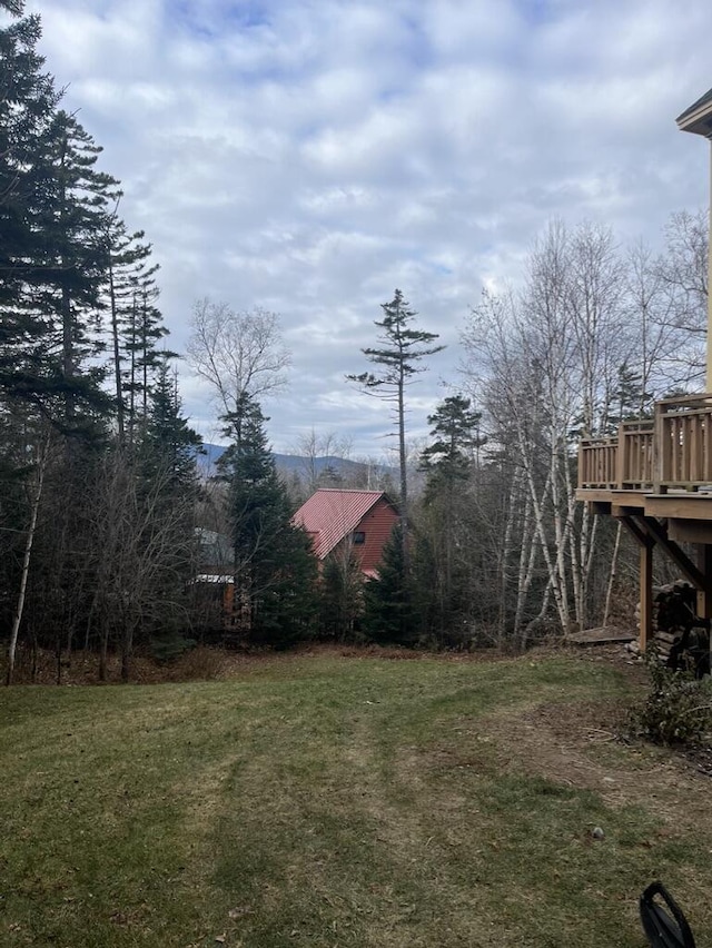 view of yard featuring a deck