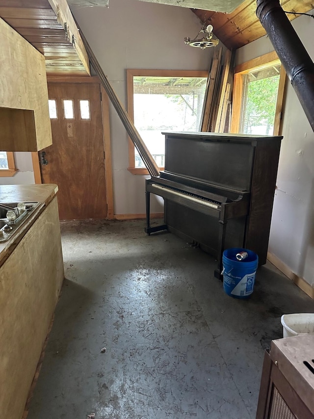 interior space featuring wood walls and a wood stove