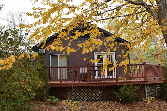 rear view of property with a deck