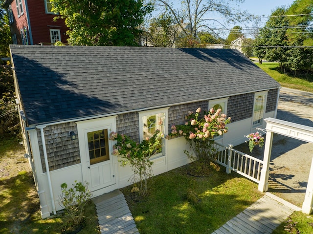 exterior space with a front lawn