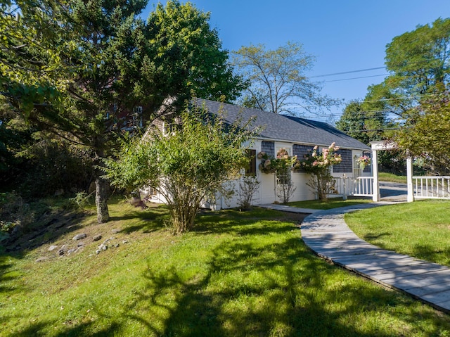 view of front of property with a front lawn