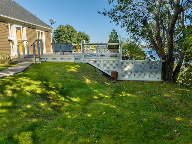 view of yard featuring a wooden deck