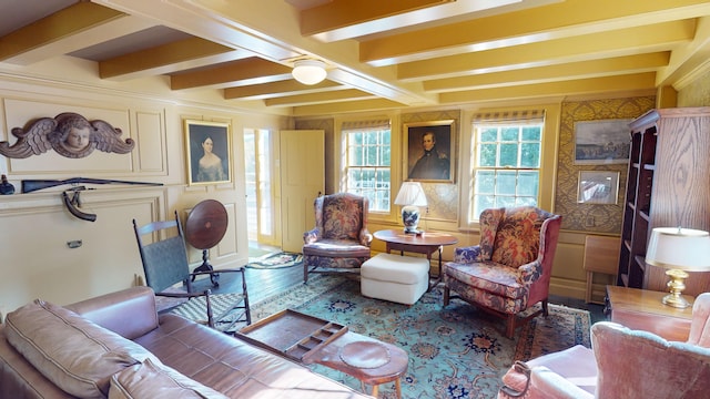 living room featuring hardwood / wood-style floors and beamed ceiling