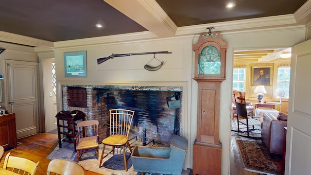 living room featuring beam ceiling, crown molding, coffered ceiling, and hardwood / wood-style flooring