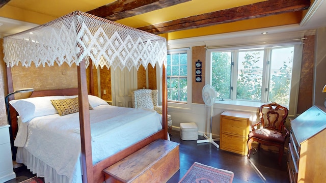 bedroom featuring beam ceiling