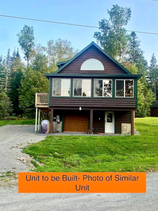 exterior space with a front yard and a garage