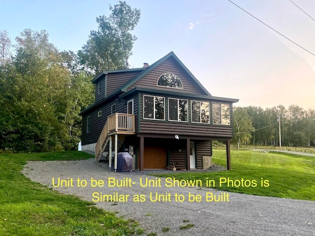 view of front of house featuring a front lawn