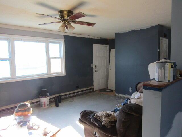 23 Dumas St, Lisbon, ME 04252 - living room featuring a ceiling fan