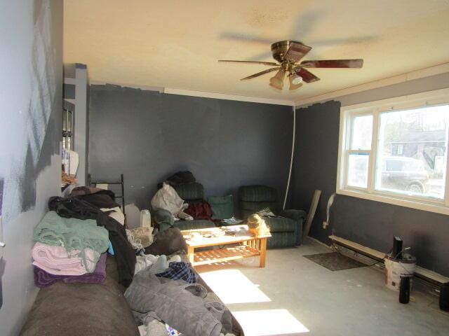 23 Dumas St, Lisbon, ME 04252 - living room with a ceiling fan and ornamental molding