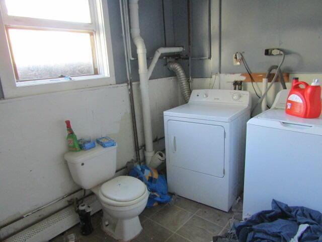 23 Dumas St, Lisbon, ME 04252 - washroom featuring independent washer and dryer and tile patterned flooring