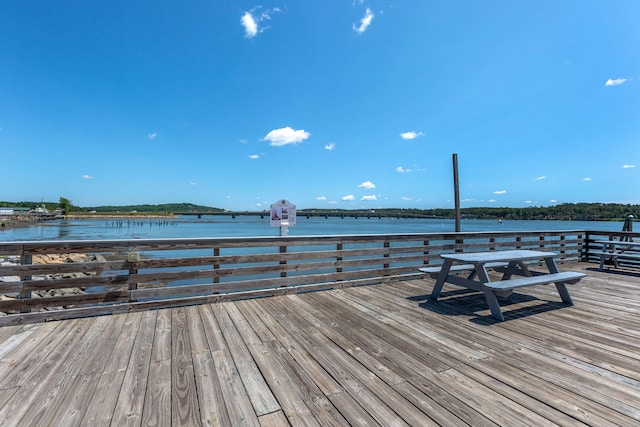 view of dock with a water view