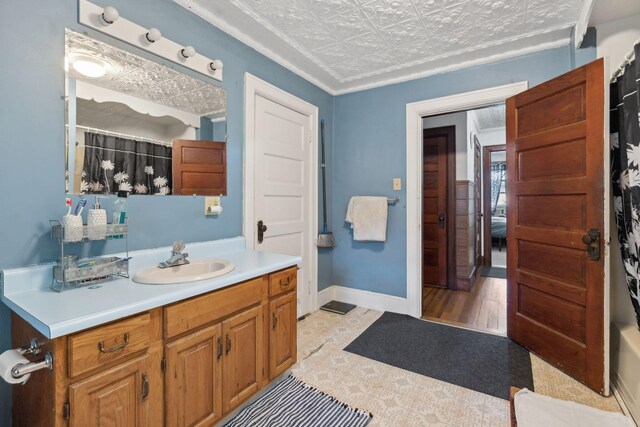 bathroom featuring vanity and hardwood / wood-style floors