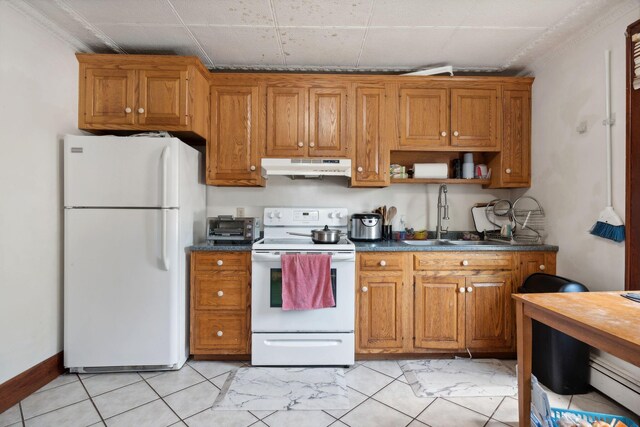 kitchen featuring light tile patterned flooring, sink, and white appliances