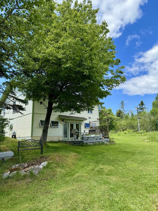 view of yard featuring a deck