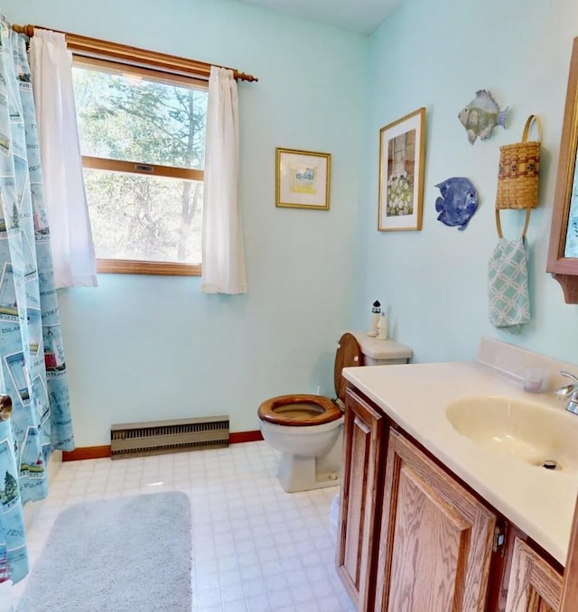 bathroom with toilet and vanity