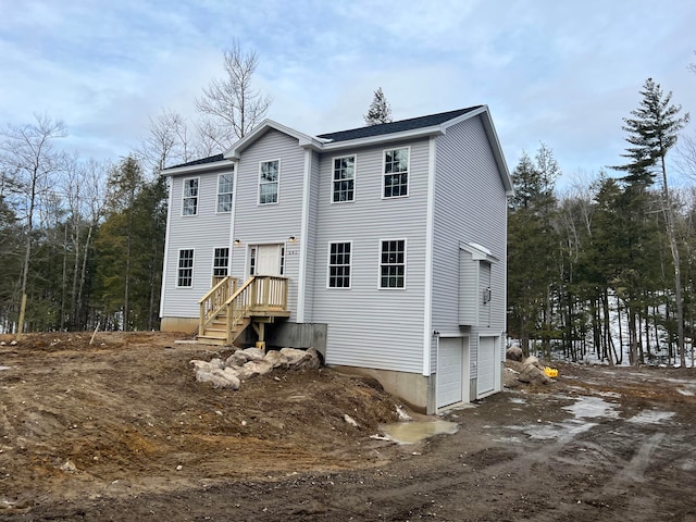 exterior space with a garage