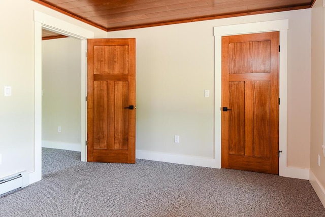 unfurnished bedroom featuring carpet, wood ceiling, and a baseboard radiator