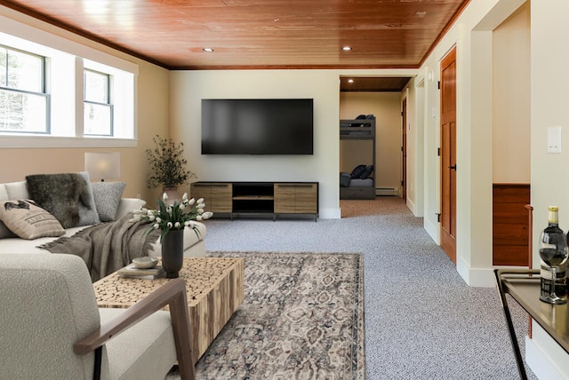 carpeted living room featuring ornamental molding, a baseboard radiator, and wooden ceiling