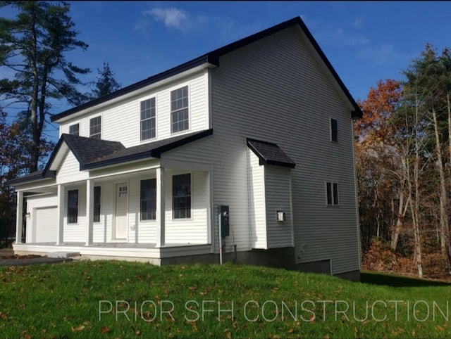 282-284 S St S, Gorham, ME 04038 - view of front facade featuring a front yard, covered porch, and an attached garage