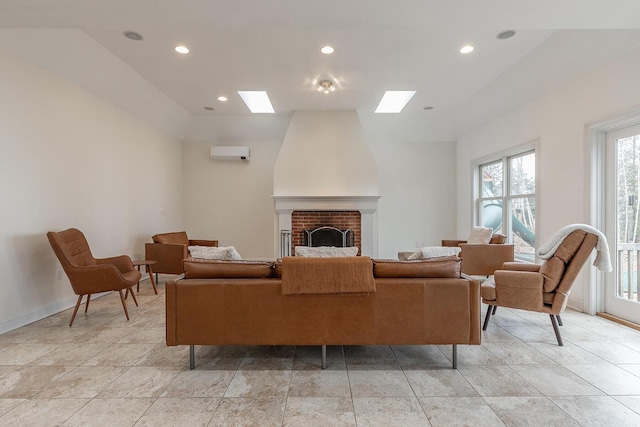 living room with a wall mounted air conditioner and a fireplace