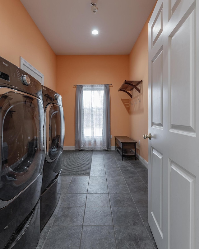 laundry room featuring separate washer and dryer